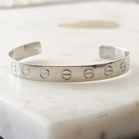 White Rhodium Plated Cuff Bracelet with a minimalist and bold design.