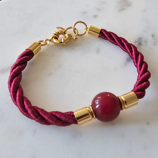 18K Gold Plated Bracelet with round rhodonite stones.