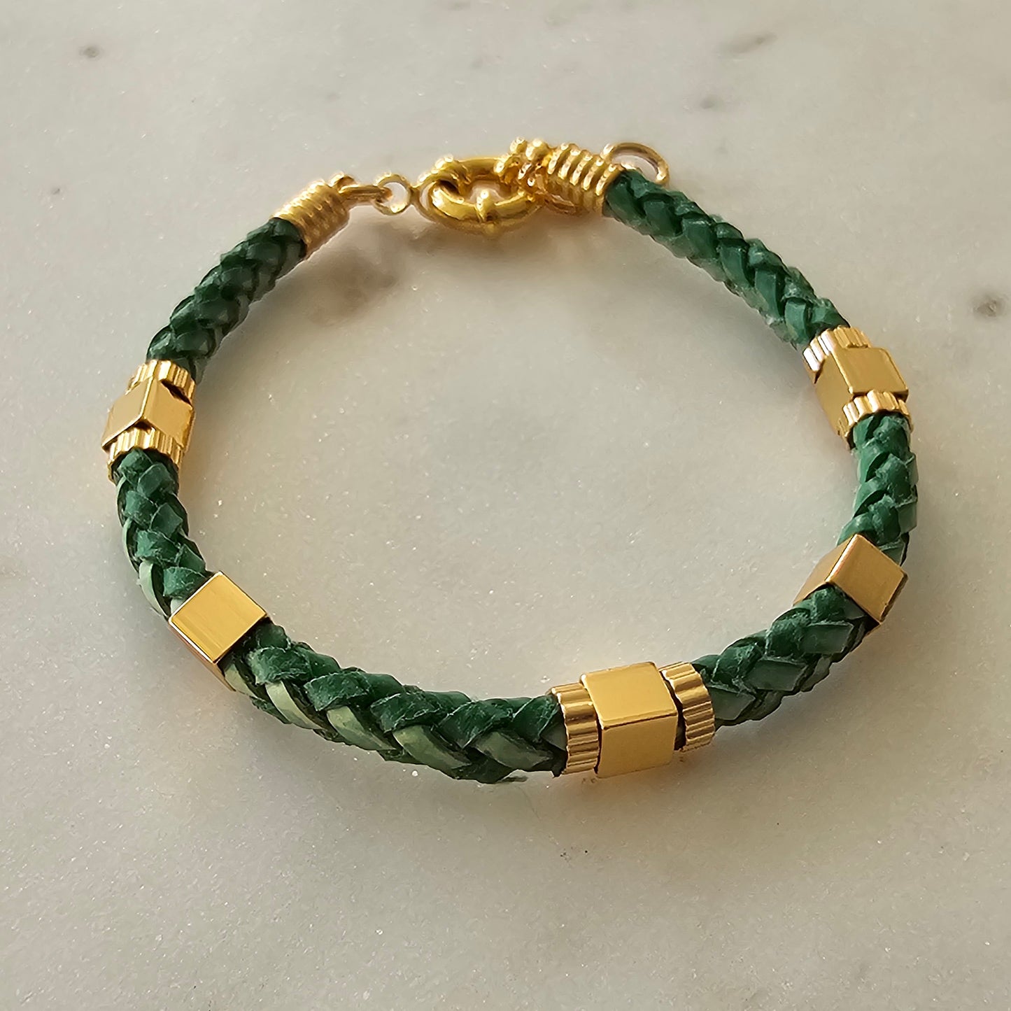 18K Gold Plated Bracelet with a minimalist leather design.