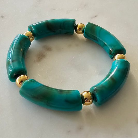 18K Gold Plated Bracelet with thick resin tube details.