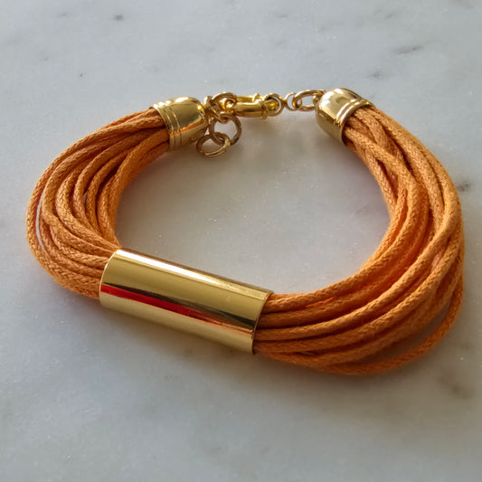 18K Gold Plated Bracelet with orange multi-wire details.