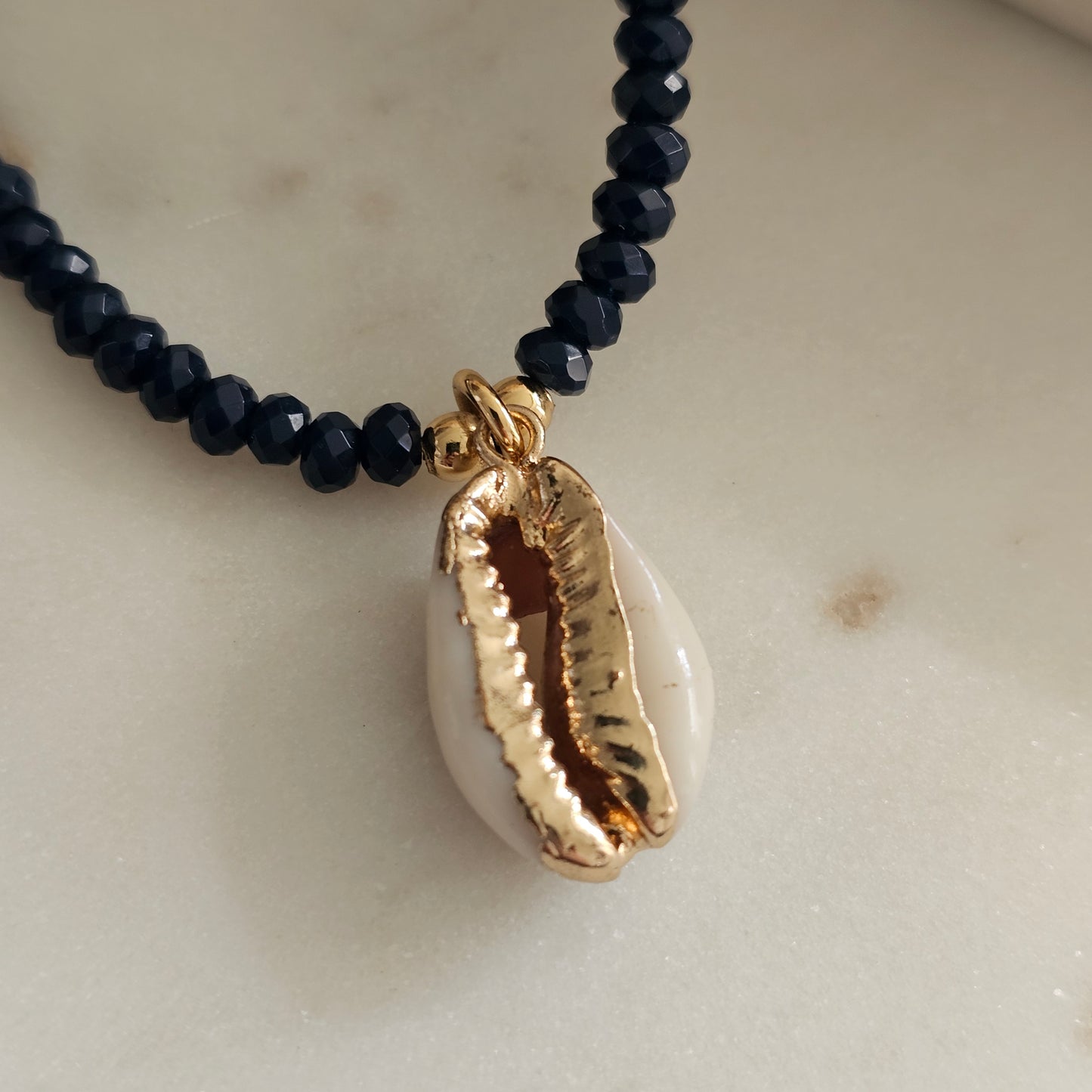 18K Gold Plated Dark Blue Crystals And Whelk Necklace