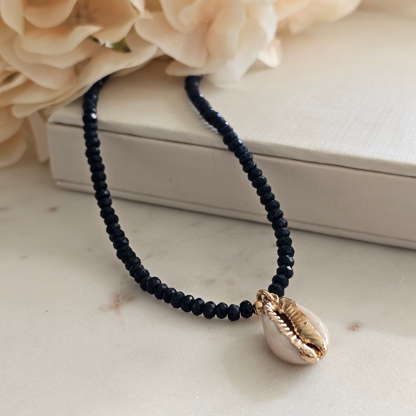 18K Gold Plated Dark Blue Crystals And Whelk Necklace