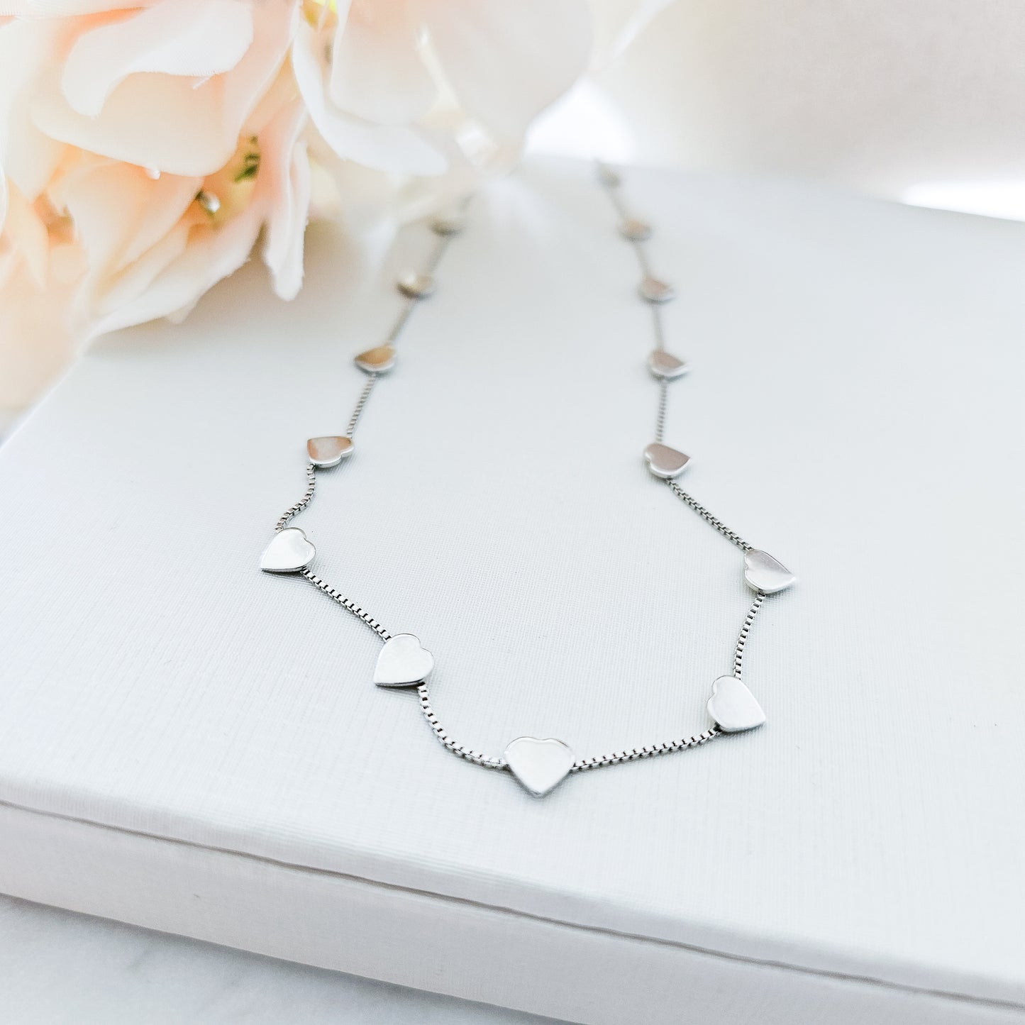 White Rhodium Plated Delicate Mini Hearts Necklace