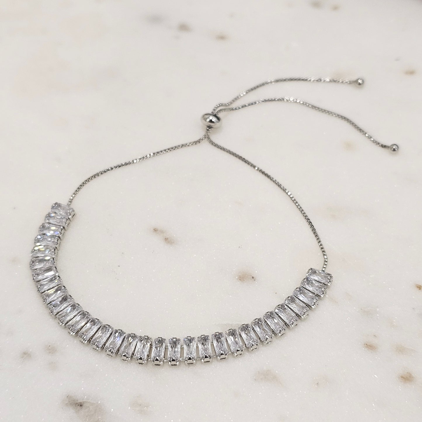 White Rhodium Plated Baguette Zirconia Adjustable Bracelet