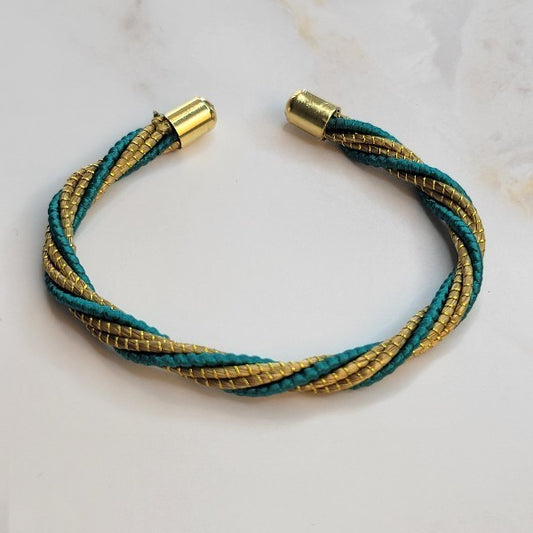 Golden Grass Open Bangle with natural green accents.