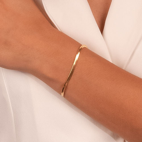 18K Gold Plated Bracelet with a flat herringbone pattern.