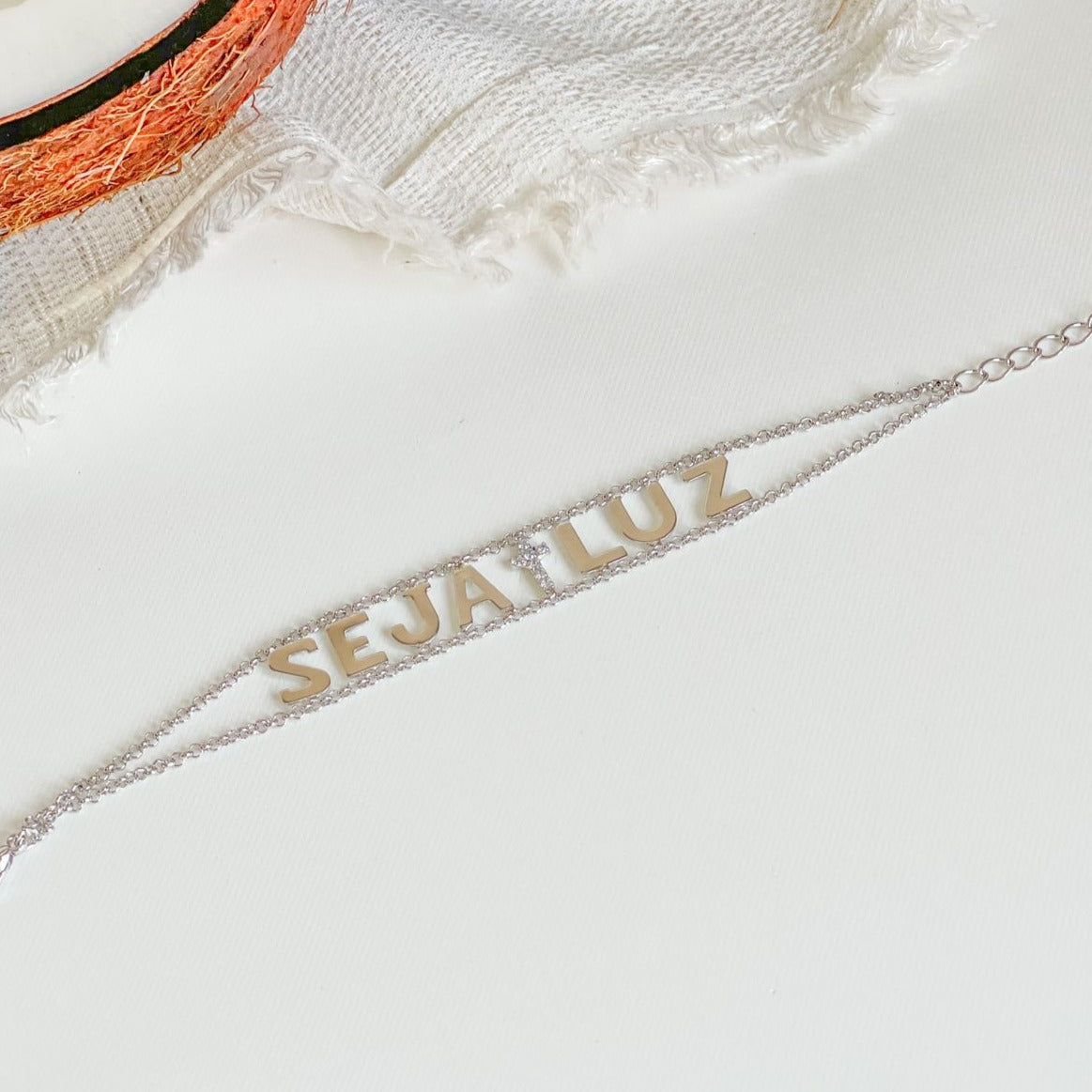 White Rhodium Plated Bracelet with religious zirconia details.