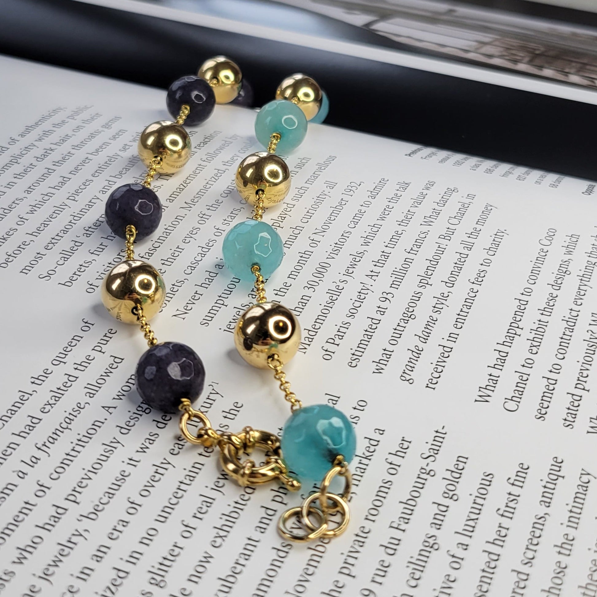 18K Gold Plated Bracelet with golden and stone ball accents.