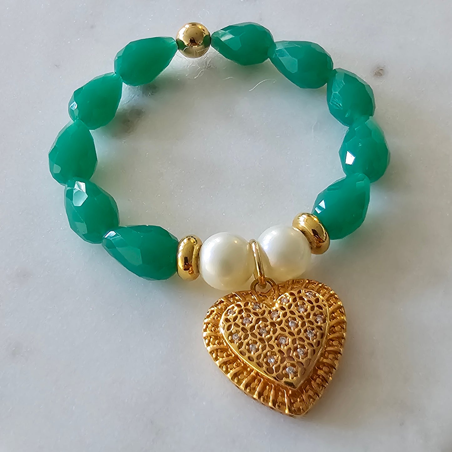 18K Gold Plated Bracelet with green pear stones and studded hearts.