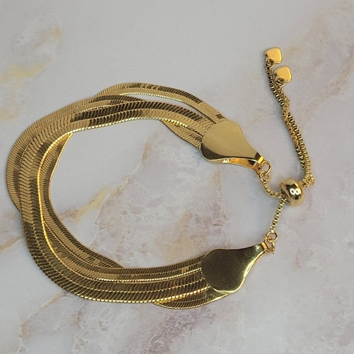 18K Gold Plated Adjustable Bracelet with flat herringbone layers.