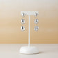 White Rhodium Plated Trio Click Hoops Earrings