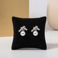 Studded Zirconia Bow and Pearl Earrings - White Rhodium Plated