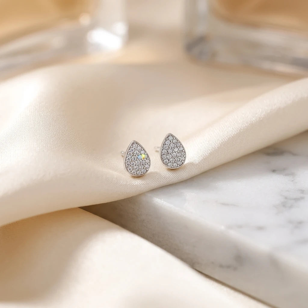 Delicate Teardrop Studded Zirconia Stud Earrings - White Rhodium Plated