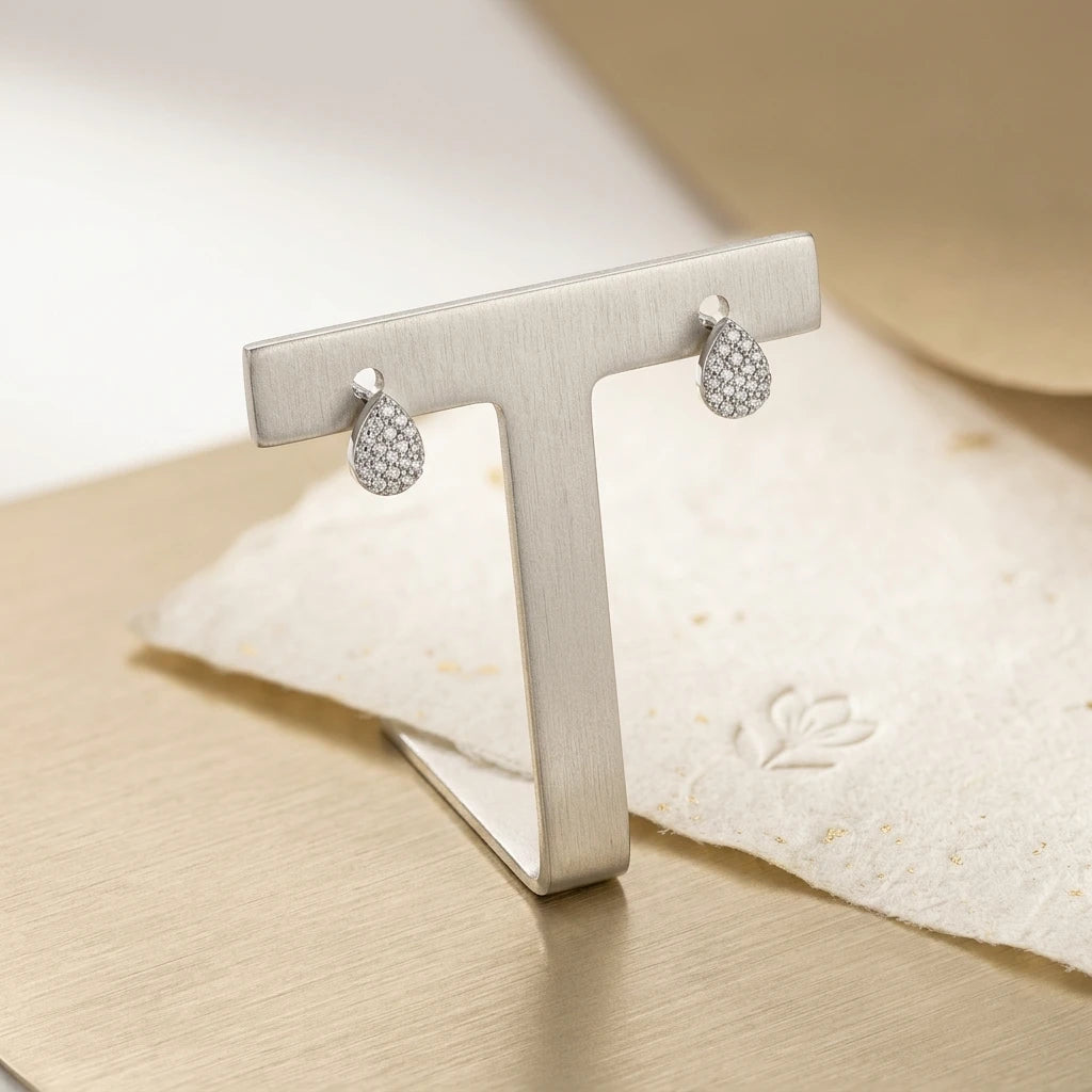 Delicate Teardrop Studded Zirconia Stud Earrings - White Rhodium Plated