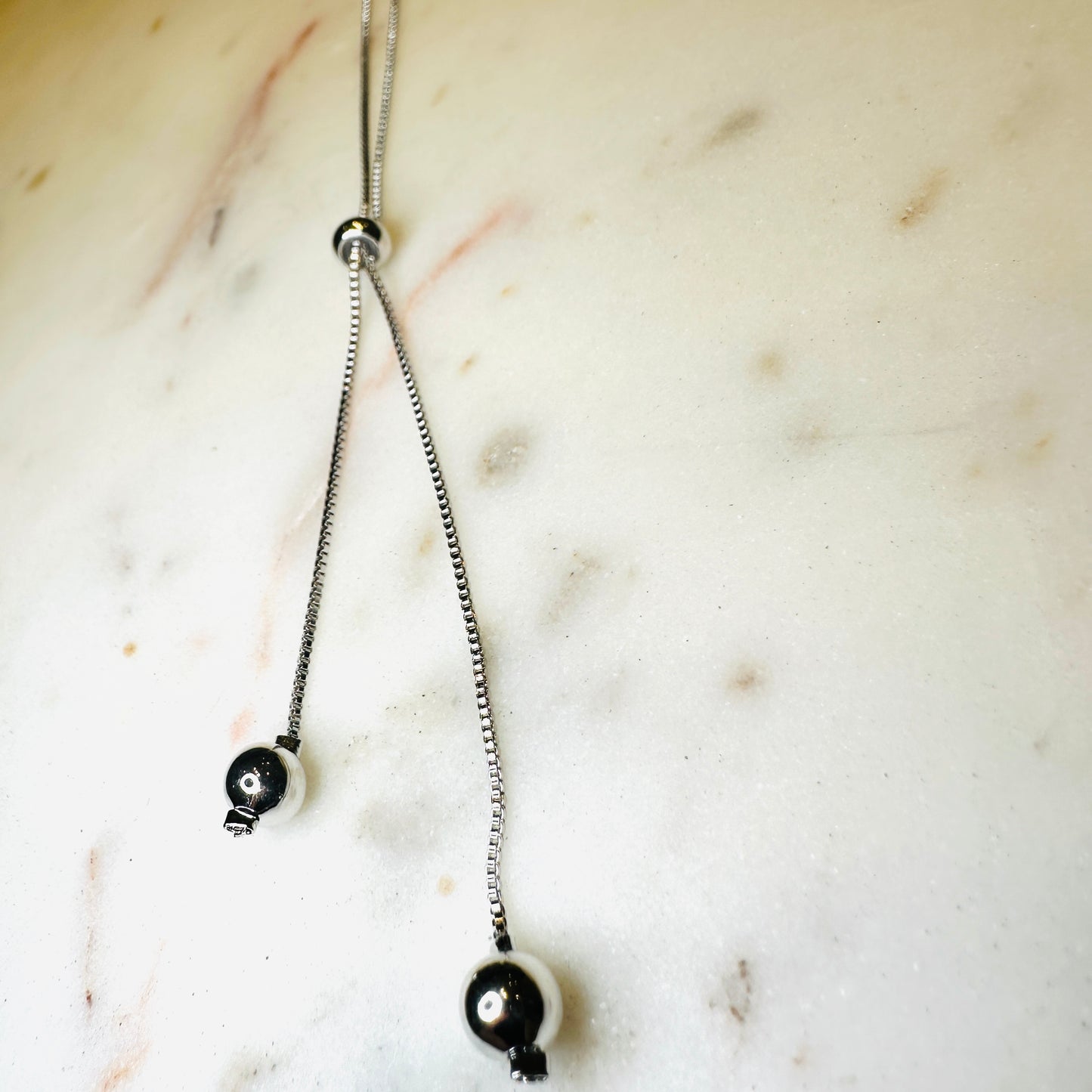 Tie Chain with Balls White Rhodium Plated Necklace
