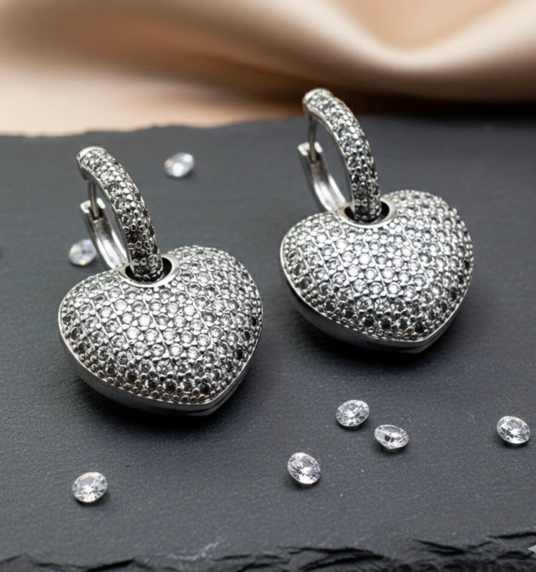 Bold Dangling Heart Studded Zirconia Earrings -White Rhodium Plated