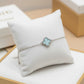 Blue Lucky Clover Bracelet - White Rhodium Plated